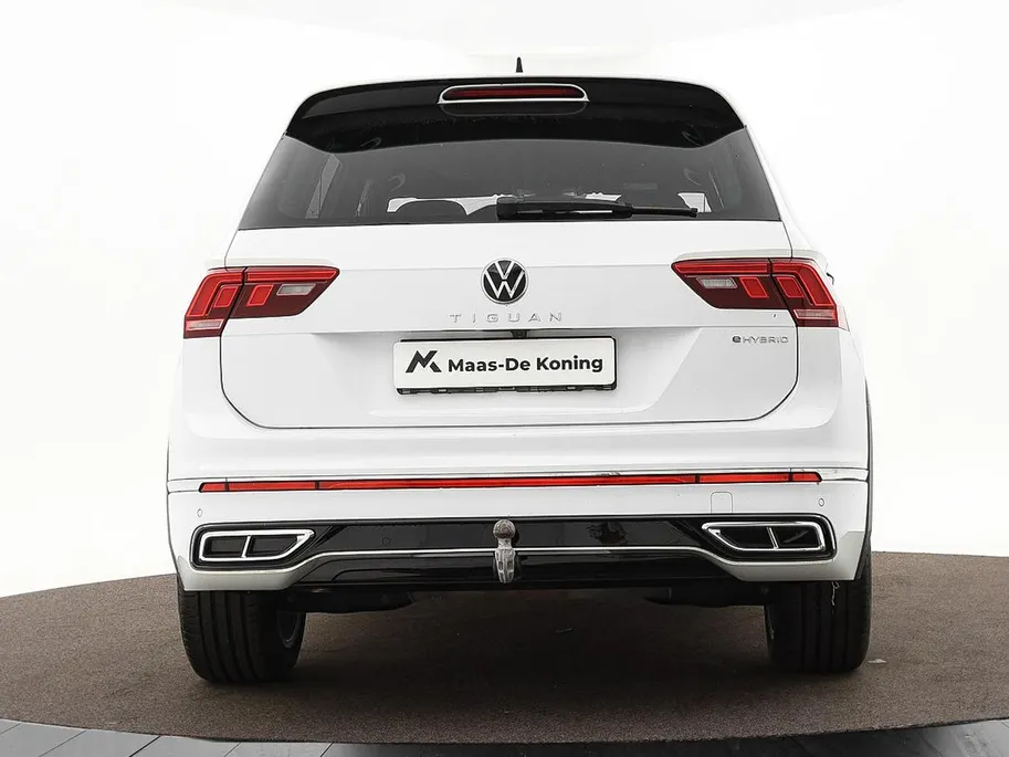Volkswagen Tiguan 1.4 TSI eHybrid 245pk DSG R-Line Business · Camera · Inklap. Trekhaak · Dodehoeksensor · Parkeer Assistent · Stuur- & Stoelverwarming · 19'Velgen ·