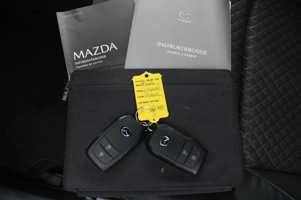 Mazda 2 Hybrid 1.5 Select | Airco | Navi | Cruise | PDC | Head-up display | Keyless | Camera |
