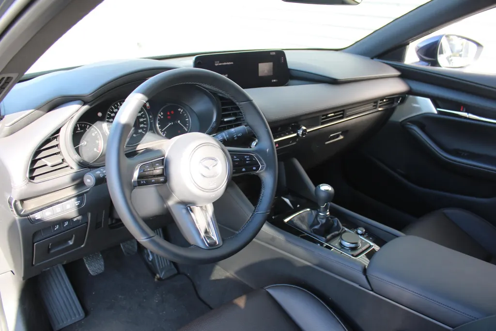 Mazda 3 2.0 e-SkyActiv-G 122PK 6MT Exclusive-line | Leder | Bose Audio | 360° Camera | Elek. stoelverstelling | Keyless | Heads up Display |