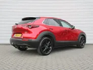 Mazda CX-30 2.0 e-SkyActiv-G M Hybrid Homura | Trekhaak | Camera | Stoelverwarming | HUD | 18" LM | Dodehoek detectie | Elek. achterklep | Cruise adapt. | LED |
