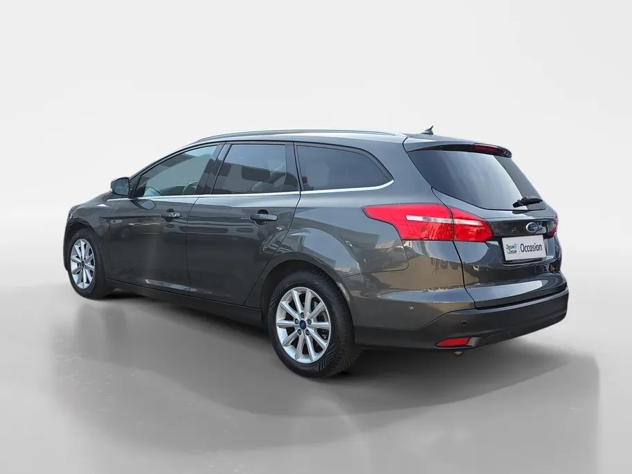 Ford Focus Wagon 1.0 Titanium | Goed onderhouden! | Apple Carplay/Android Auto | Cruise Control | Achteruitrijcamera | Climate Control | Parkeersensoren rondom | 12 maanden garantie! |