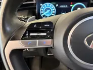 Hyundai Tucson 1.6 T-GDI PHEV Premium Sky 4WD | 66km WLTP elektrisch | Navigatie | Adaptive cruise control | Trekhaak | Apple Carplay & Android Auto | Dode hoek detectie | Draadloze telefoonlader |