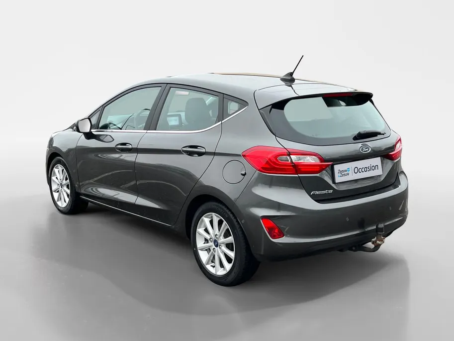 Ford Fiesta 1.0 EcoBoost Titanium Automaat | NL auto | Dealer onderhouden | Trekhaak | Winter Pack | Parkeersensoren voor en achter | Achteruitrijcamera | Cruise control | Apple carplay & Android auto | 16' lichtmetalen velgen | Bovag garantie |
