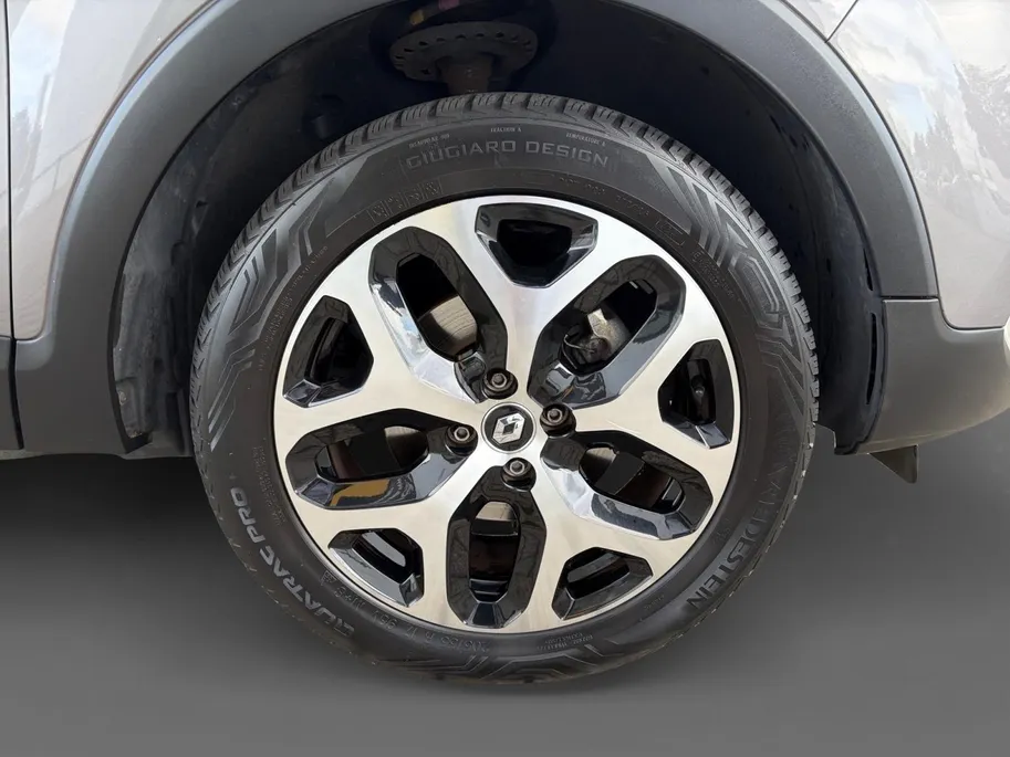 Renault Captur 120PK TCe Intens | Trekhaak | 1200KG Trekgewicht | Stoelverwarming |  Parkeersensor | Lichtmetalen Velgen | Licht & Regen Sensor | Cruise Control | Climate Control | Navigatie |