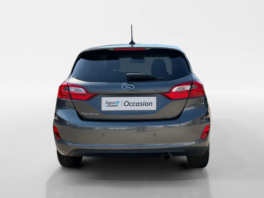 Ford Fiesta 1.0 EcoBoost Titanium | Dealer onderhouden | Winter pack | Parkeersensor achter | Apple carplay & Android auto | Navigatie via carplay | Cruise control | Elektr. inklapbare buitenspiegel | Privacy glas |