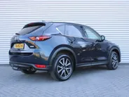 Mazda CX-5 2.0 SkyActiv-G 165 Skylease Luxury | Trekhaak | 360 Camera | Leer | Stuur-/stoelverwarming | HUD | Bose | Elek. stoelverstelling | 19' LM | All seasons |