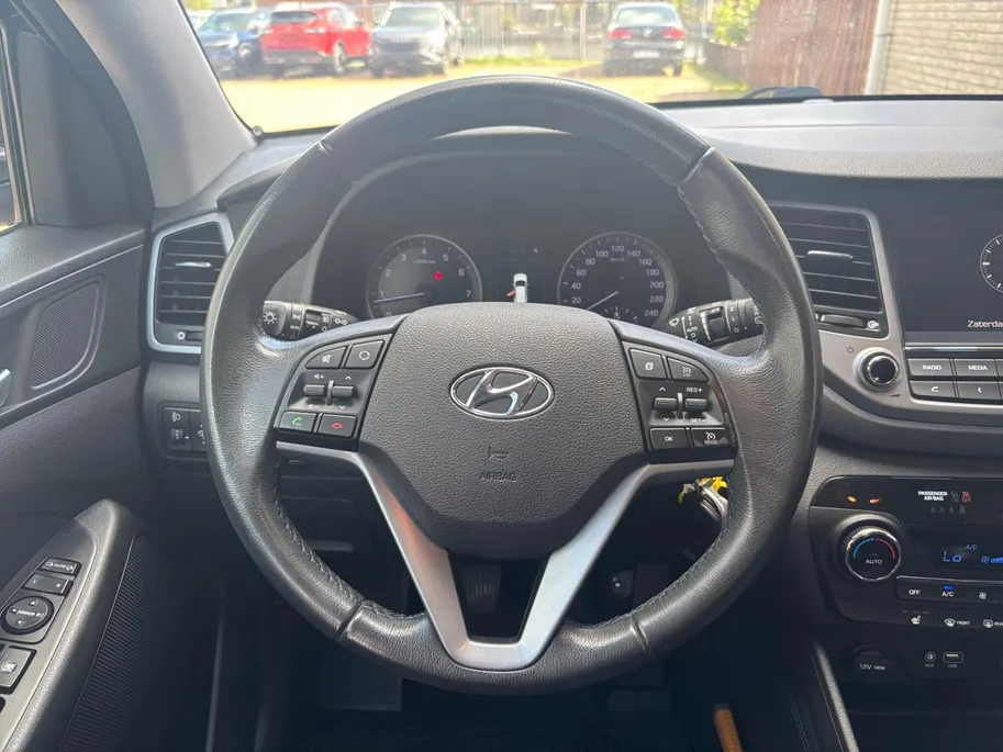 Hyundai Tucson 1.6 GDi Comfort *Navi+Camera*Climate Control*Trekhaak*Stoelverwarming*LM.Velgen*1ste eigenaar!