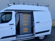 Ford Transit Custom 300 2.0 TDCI L1H2 Trend 130pk Automaat Store Van laadruimteinrichting - Speciale dak Imperiaal - 2x Schuifdeur - Trekhaak -Comfort Laadschot
