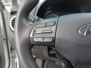 Hyundai Kona 1.6 GDI HEV Premium | Trekhaak | Apple Carplay/Android Auto | Adaptive cruise control | Dodenhoek herkenning | Leren bekleding