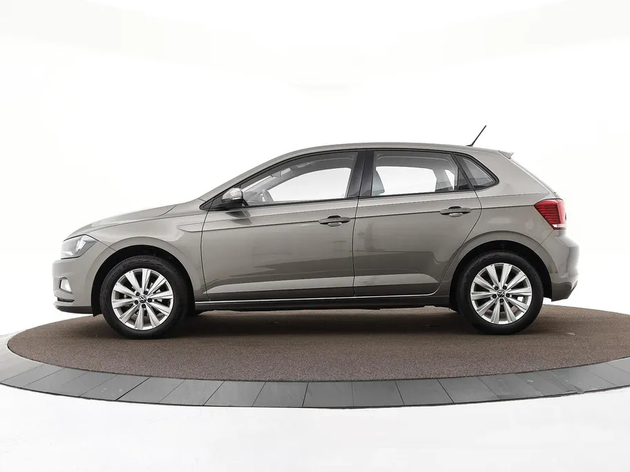 Volkswagen Polo 1.0 TSI 95pk Highline · Apple/Android Car Play · Navigatie · Clima · 16'Velgen · Sportstoelen · Draadloze Telefoonlader ·