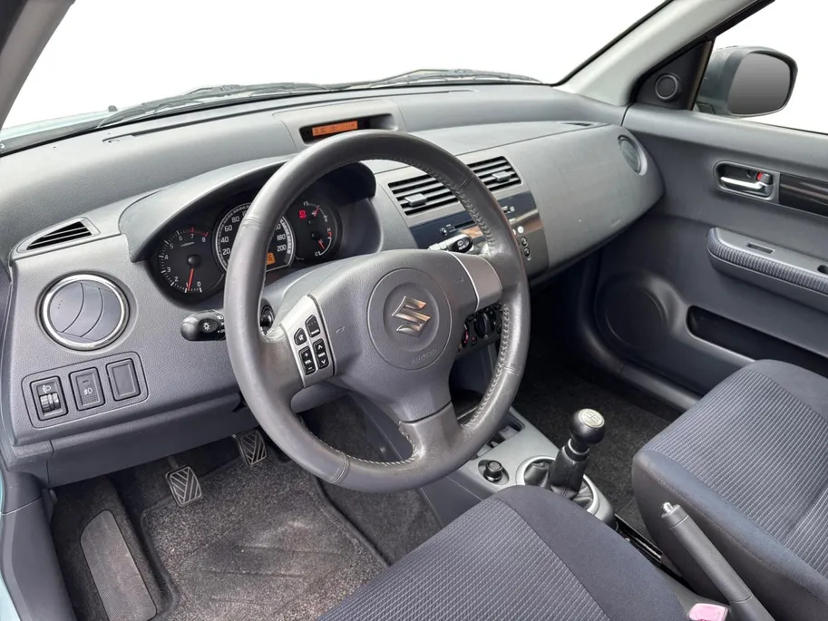 Suzuki Swift 1.3 Shogun | Trekhaak | Airco | 12 maanden garantie | Lichtmetalen velgen | Radio/CD Speler