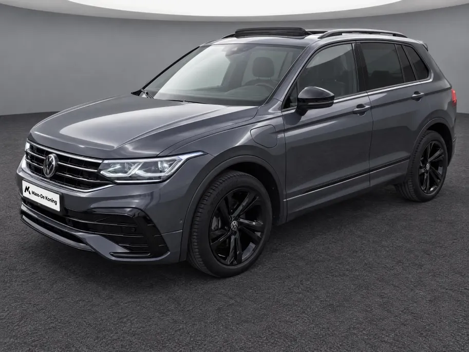 Volkswagen Tiguan 1.4TSIeHybrid 180kW/245PK R-Line Black Style · Panoramadak · Leder · 360°Camera + Parkeersensoren · Stoelverwarming · Elektr. stoelverstelling ·