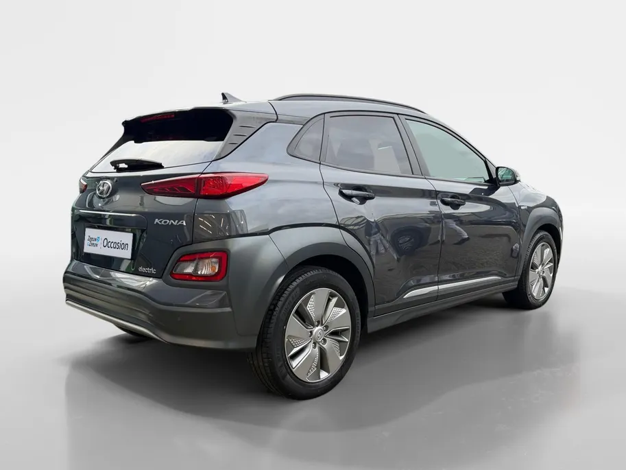 Hyundai Kona EV Fashion 64 kWh | Zeer nette auto | 100 % SOH | Stoelverwarming | Navigatie | Apple CarPlay & Android Auto | Achteruitrijcamera | Dealer onderhouden |