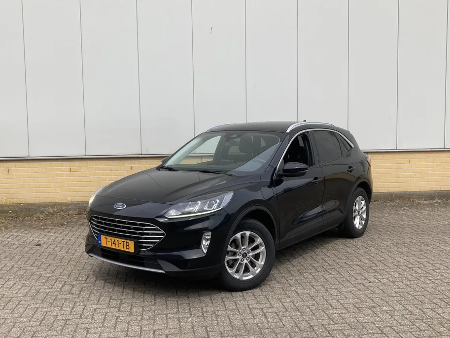 Ford Kuga 2.5 PHEV 225 pk Titanium Winter Pack - Draadloos opladen telefoon Origineel NL auto met weinig km.