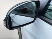 Hyundai Kona EV Premium 64 kWh | Achteruitrijcamera | Head Up Display | Dodehoek Detectie | Lederen Bekleding | Climate Control |