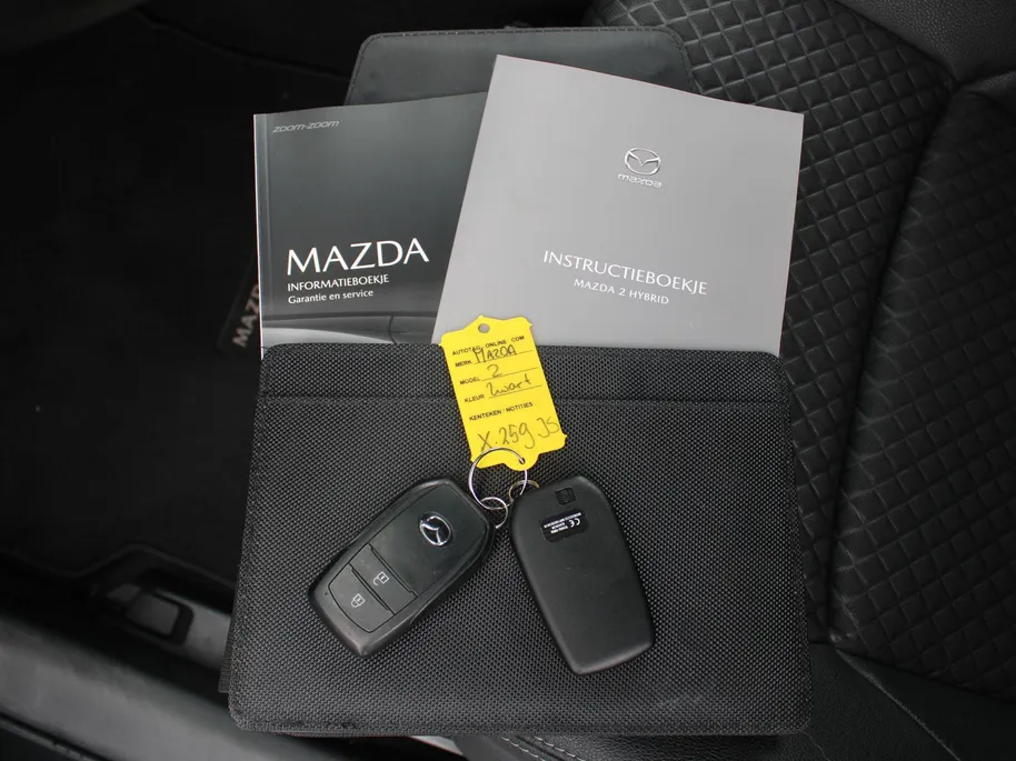 Mazda 2 Hybrid 1.5 Select | 16" LM | Stoel- & stuurverwarming | HUD | Camera | Dodehoek sensor | Clima | Apple Carplay/Android Auto |