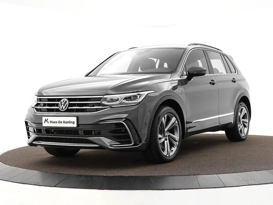 Volkswagen Tiguan 1.4 TSI 245pk DSG eHybrid R-Line Business · Apple/Android Car Play · Wegklapbare Trekhaak · Alarm · Dodehoek Detectie · Stoel-& Stuurverwarming · 19'' Inch ·