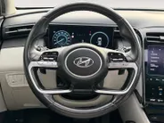 Hyundai Tucson 1.6 T-GDI PHEV Premium Sky 4WD | Zeer compleet | Open dak | Unieke bekleding | Trekhaak | 360 graden camera | Stoel koeling & verwarming |