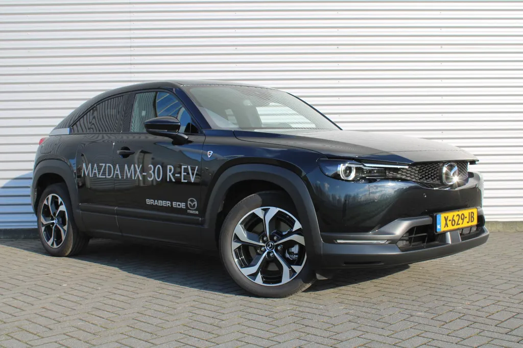 Mazda MX-30 e-SkyActiv R-EV 170 Advantage Industrial | Stoelverwarming | HUD | Dodehoek detectie | Elek. stoelverstelling | LED | 18' LM | Camera |