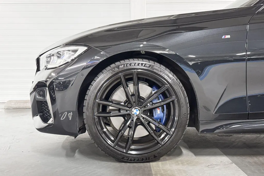 BMW 3 Serie Touring M340i xDrive High Executive