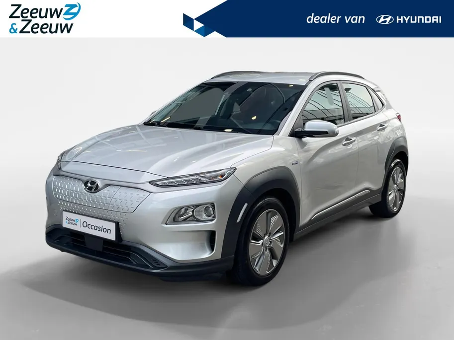 Hyundai Kona EV Comfort 64 kWh 204PK | Warmtepomp | 100% SOH | Adaptive cruise control | Apple Carplay & Android Auto | Achteruitrijcamera | Parkeersensoren achter | Keyless entry | DAB radio |
