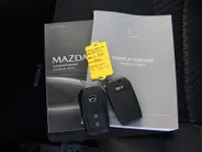 Mazda 2 Hybrid 1.5 Select | Airco | Navi | Cruise | PDC | Head-up display | Camera |