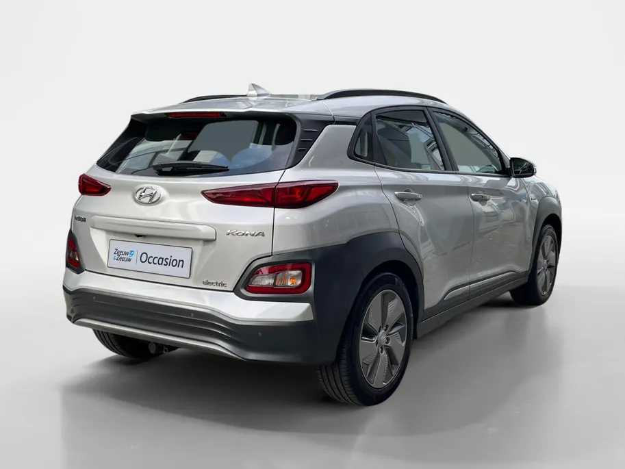 Hyundai Kona EV Comfort 64 kWh 204PK | Warmtepomp | 100% SOH | Adaptive cruise control | Apple Carplay & Android Auto | Achteruitrijcamera | Parkeersensoren achter | Keyless entry | DAB radio |