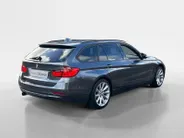 BMW 3 Serie Touring 316i Executive Sport NL Auto | unieke km.stand | navigatie | lm velgen | cruise | etc.