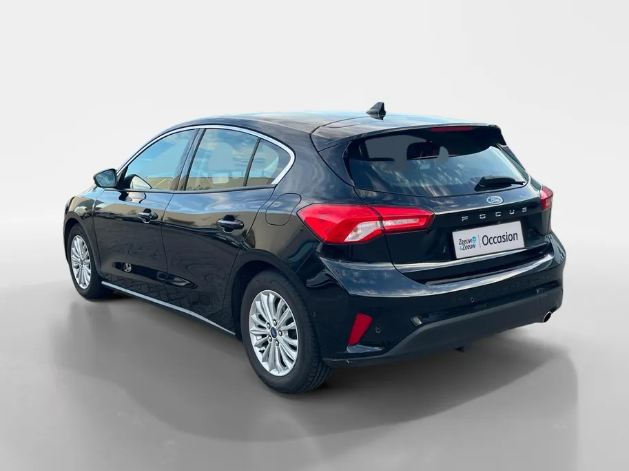Ford Focus 1.0 EcoBoost Titanium Business | Navigatie | Apple carplay & Android auto | Winter pack | BLIS | Parkeersensoren voor en achter | Achteruitrijcamera | Trekhaak | Cruise control | Airco | Bovag garantie |