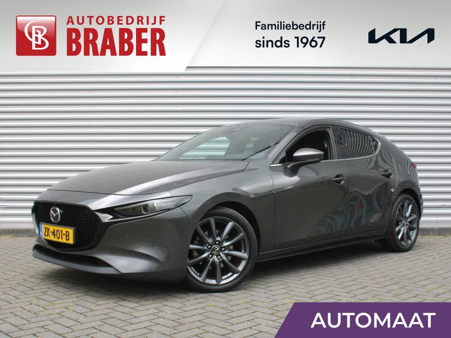 Mazda 3 2.0 e-SkyActiv-G M Hybrid 122 Luxury | Trekhaak | Stuur-/stoelverwarming | Leer | 360 Camera | Stoelgeheugen | 18' LM | HUD | LED | Cruise adapt. |