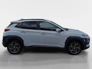 Hyundai Kona 1.6 GDI HEV Premium | Trekhaak | Apple Carplay/Android Auto | Adaptive cruise control | Dodenhoek herkenning | Leren bekleding