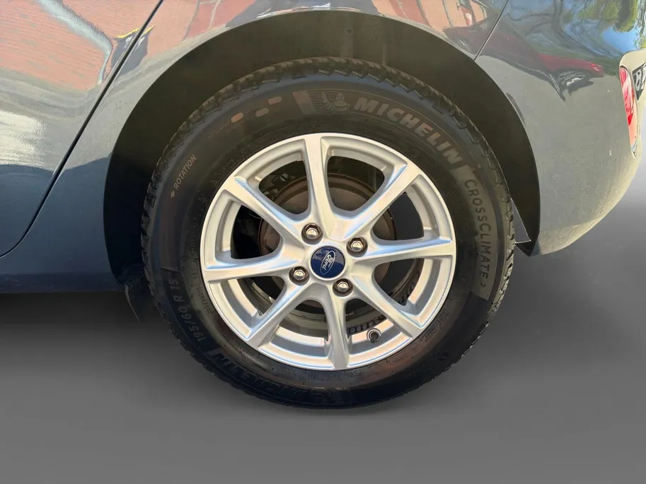 Ford Fiesta 1.0 EcoBoost Titanium | 1e Eigenaar | NL-Auto | Navigatie | Climate Control | Cruise Control | Parkeersensoren | Lichtmetalen velgen | All Weather banden