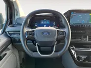 Ford Transit Custom 320 2.5 PHEV L2H1 Black Platinum DC EXCL. BTW &  | 233 pk Automaat | Lederen bekleding | Navigatie | Treeplanken | LM velgen 17' zwart | 360 graden camera | Dubbele schuifdeur