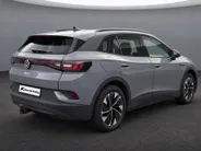 Volkswagen ID.4 Pro Business Advantage 77 kWh 204pk · SOH 94,4% · 360 Camera · Inklap. Trekhaak · Stuur- & Stoelverwarming · Adaptive Cruise Control · Dodehoeksensor · Elek. Achterklep ·