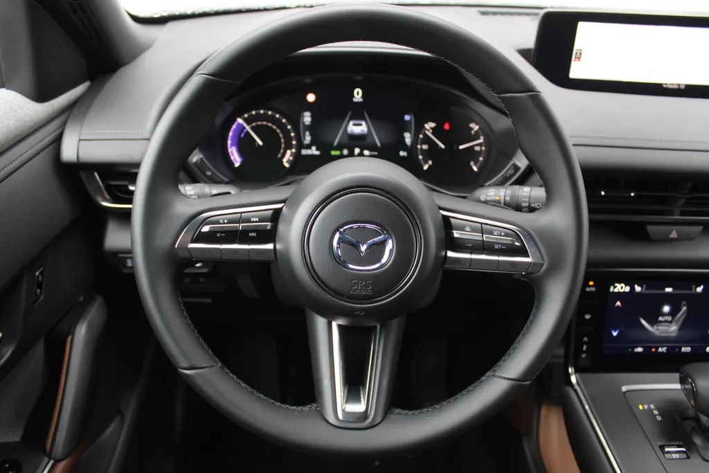 Mazda MX-30 e-SkyActiv R-EV 170 Advantage Industrial | Stoelverwarming | HUD | Dodehoek detectie | Elek. stoelverstelling | LED | 18' LM | Camera |