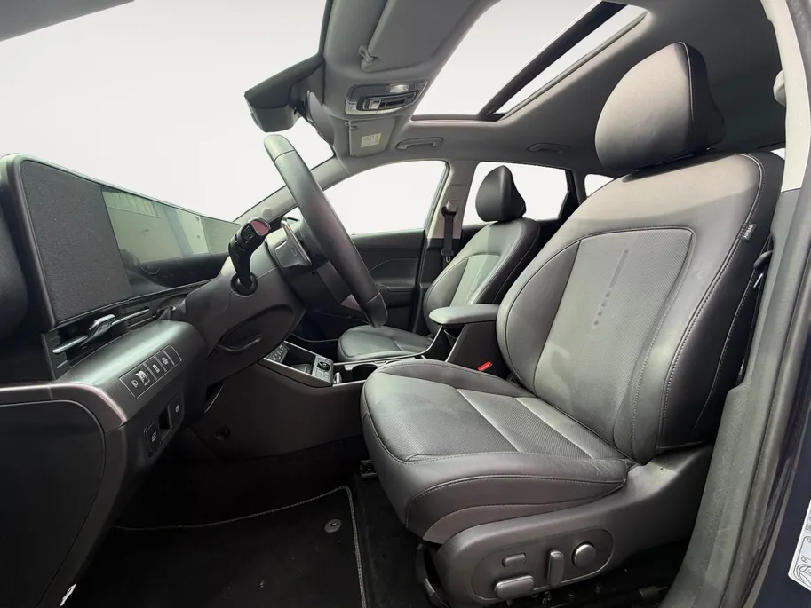 Hyundai Kona 1.6 GDI HEV Premium Sky | Schuif-kanteldak| Stoelverwarming/koeling| Lederen bekleding| Bose| Elektrische stoelen met geheugen| BOM VOL OPTIES