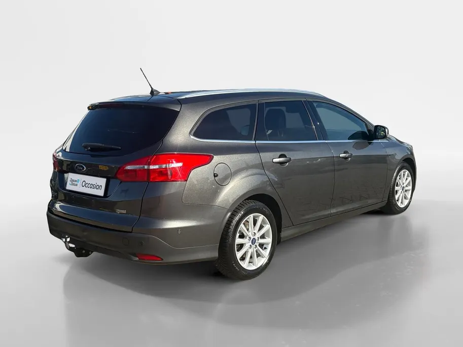 Ford Focus Wagon 1.0 Titanium |Lederen/stof bekleding| Trekhaak| bi-xenon koplampen| keyless entry| 12 maanden Bovag garantie|