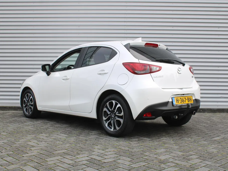 Mazda 2 1.5 Skyactiv-G GT-M | Trekhaak | Camera | Stoelverwarming | 16' LM | Navi | Cruise | Clima | Dodehoek detectie | LED | HUD |