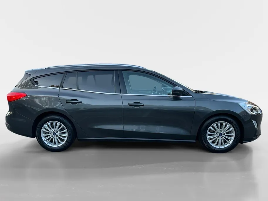 Ford Focus Wagon 1.0 EcoBoost Titanium Business | B&O | Adaptieve Cruise Control | Winter Pack | Privacy Glass | Navigatie | All weather banden