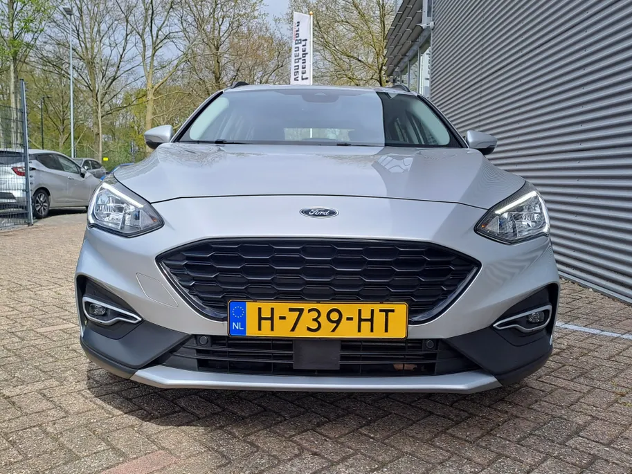Ford Focus Wagon 1.0 EcoBoost Active Business | Navi | PDC | Cruise | Trekhaak | ECC | Stoel, Stuur, Voorruit verwarming