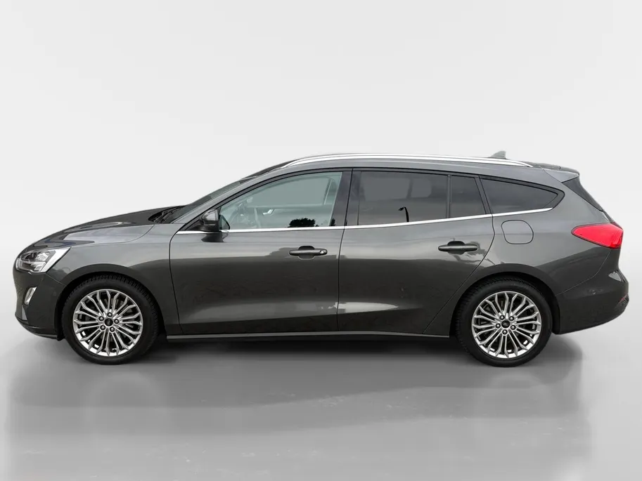 Ford Focus Wagon 1.0 EcoBoost Titanium Business | Trekhaak | HUD | Achteruitrijcamera | Winter Pack | Dodehoek detectie | Elektr. Achterklep | 12 maanden garantie! |