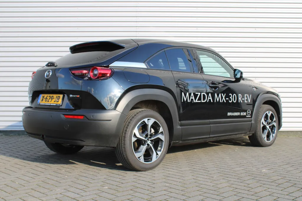 Mazda MX-30 e-SkyActiv R-EV 170 Advantage Industrial | Stoelverwarming | HUD | Dodehoek detectie | Elek. stoelverstelling | LED | 18' LM | Camera |