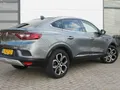Renault Arkana 1.6 E-Tech Hybrid 145 PK Intens | Elektrisch bedienbare trekhaak | Camera achter | Bose geluid | Groot scherm | Reservewiel | Dode hoek sensoren | Adaptieve cruise controle |