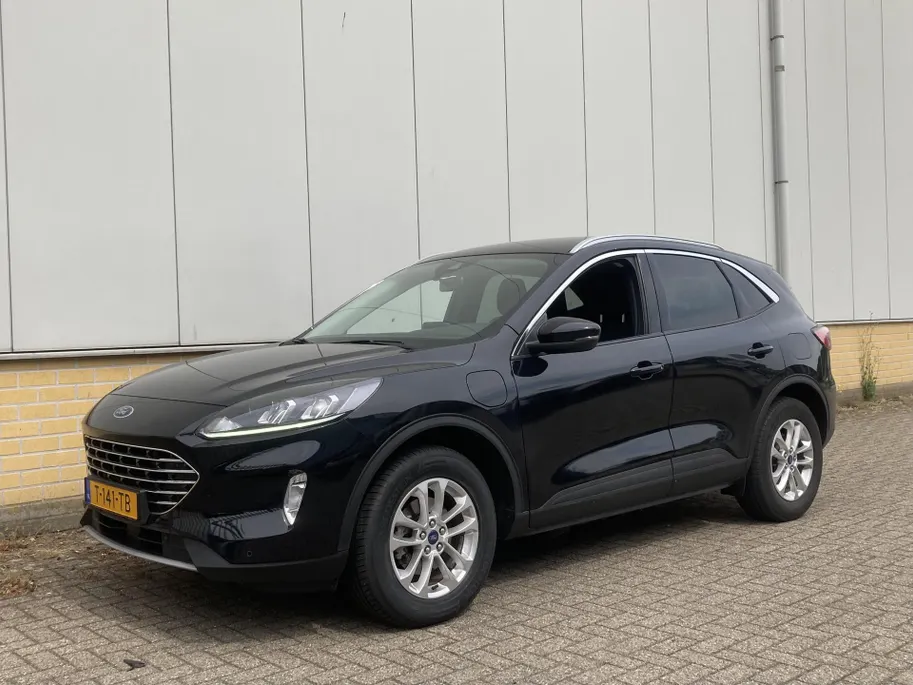 Ford Kuga 2.5 PHEV 225 pk Titanium Winter Pack - Draadloos opladen telefoon Origineel NL auto met weinig km.