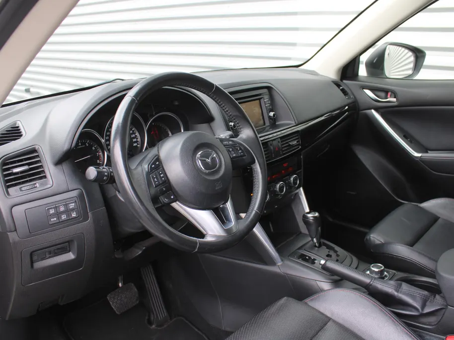 Mazda CX-5 2.0 GT-M 4WD | Stoelverwarming | 19' LM | Clima | Navi | Leer | Cruise | Camera | Xenon | Volledig dealer onderhouden! | Zeer nette auto |