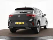 Volkswagen T-Roc 1.5 TSI 150pk DSG R-Line Business · Camera · Apple/Android Car Play · Stoelverwarming · Parkeerassistent · ACC · Draadloze Telefoonlader · Garantie t/m 12-04-2027 of 100.000