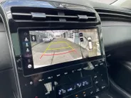 Hyundai Tucson 1.6 T-GDI PHEV Premium Sky 4WD | Zeer compleet | Open dak | 360 graden camera | Stoelverwarming & koeling | Apple CarPlay & Android Auto | Memory seats |