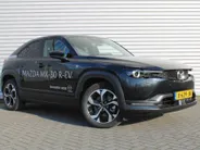 Mazda MX-30 e-SkyActiv R-EV 170 Advantage Industrial | Stoelverwarming | HUD | Dodehoek detectie | Elek. stoelverstelling | LED | 18' LM | Camera |