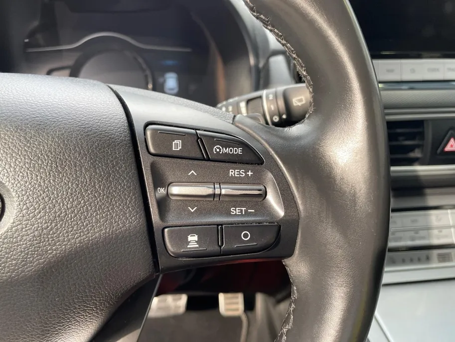 Hyundai Kona EV Comfort 64 kWh 204PK | Warmtepomp | 100% SOH | Adaptive cruise control | Apple Carplay & Android Auto | Achteruitrijcamera | Parkeersensoren achter | Keyless entry | DAB radio |