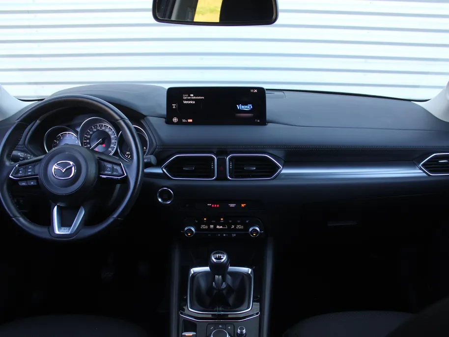 Mazda CX-5 2.0 SkyActiv-G 165 Comfort | Stuur-/stoelverwarming | Navi | Dodehoek detectie | Apple Carplay/Android Auto | Clima | PDC | Cruise | 17' LM | LED |